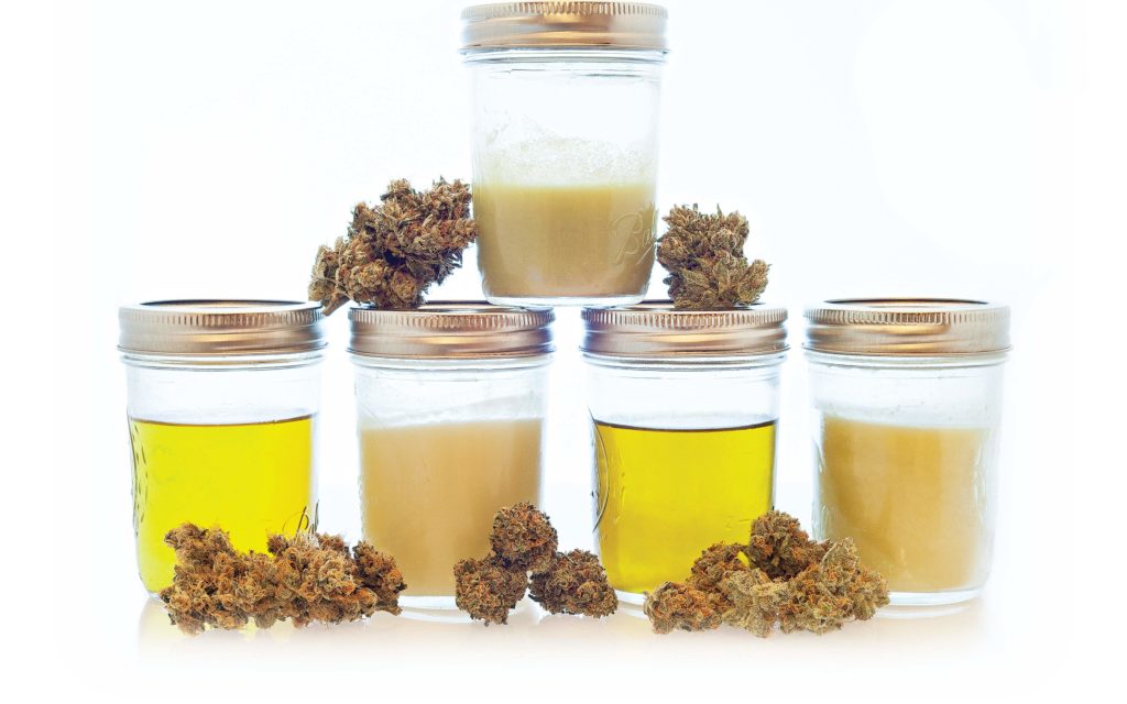 fats in jars with cannabis flowers