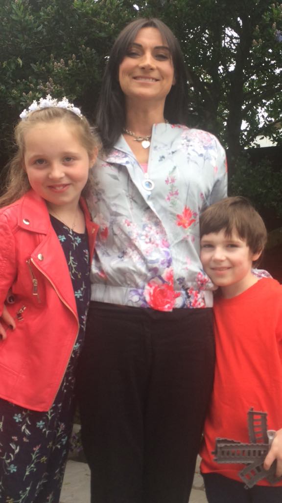 Smiling Irish family, children wearing red, happy children, CBDs of Autism co-founder Sharon McEvoy