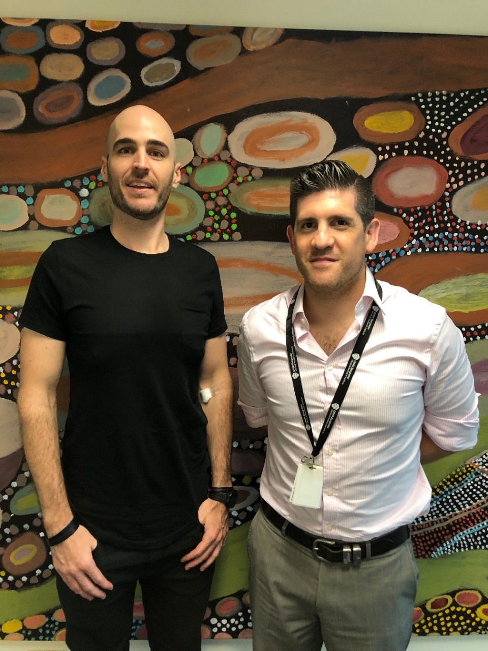 Australian Tourette's patients standing next to cannabis researcher in Australia
